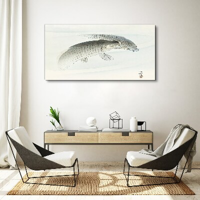 Vászonkép Hal táncol a nyugodt vízben