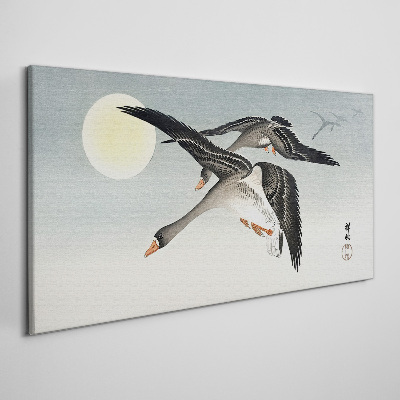 Vászonkép Liba repül a telihold alatt