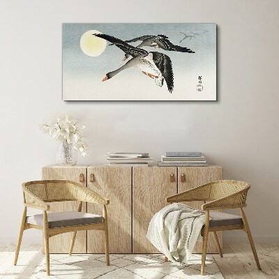 Vászonkép Liba repül a telihold alatt