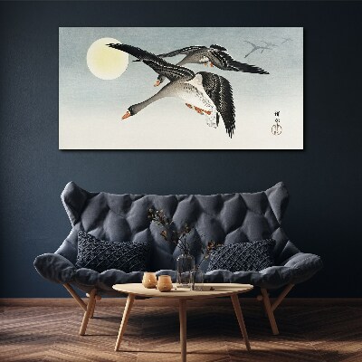 Vászonkép Liba repül a telihold alatt