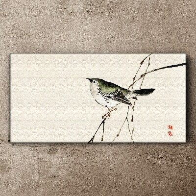 Vászonkép Madár egy ágon