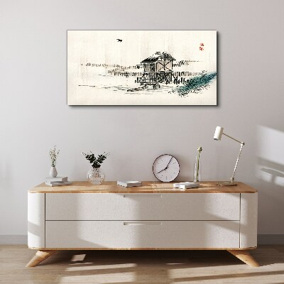 Vászonkép Csendes házikó a víz mellett