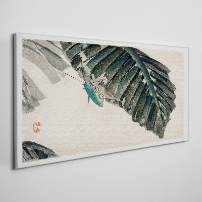 Vászonkép Egy karcsú rovar a leveleken