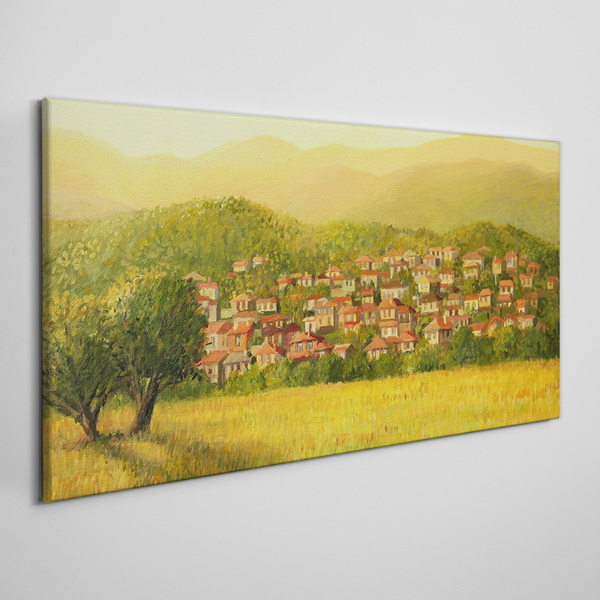 Vászonkép Napfényes falu a dombok között