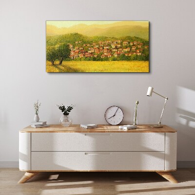 Vászonkép Napfényes falu a dombok között