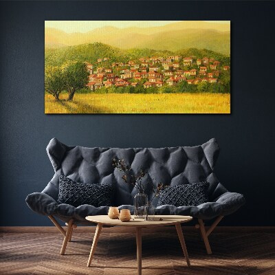 Vászonkép Napfényes falu a dombok között