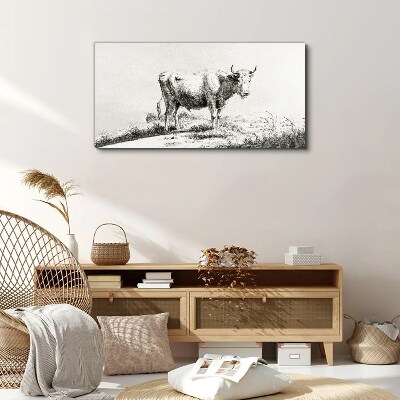 Vászonkép Fekete tehén a legelőn