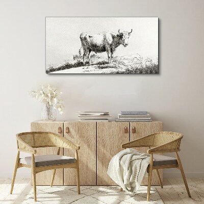 Vászonkép Fekete tehén a legelőn