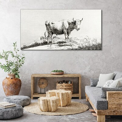 Vászonkép Fekete tehén a legelőn