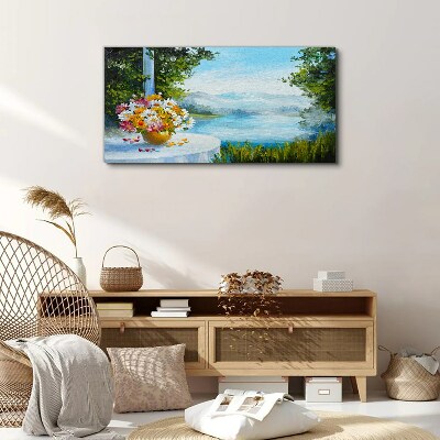 Vászonkép Virágcsokor a tó partján