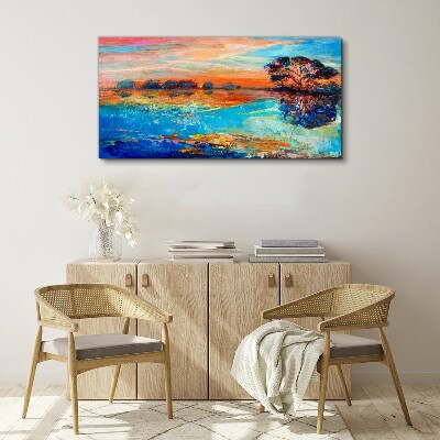 Vászonkép Naplemente a tó felett