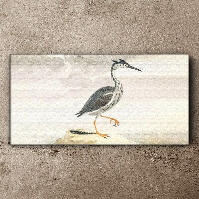 Vászonkép Egy vonuló madár a természet hátterében