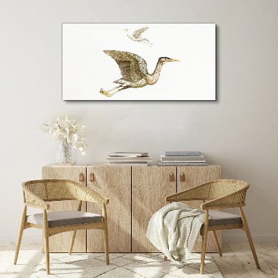 Vászonkép Madár repülése nyugodt víz felett
