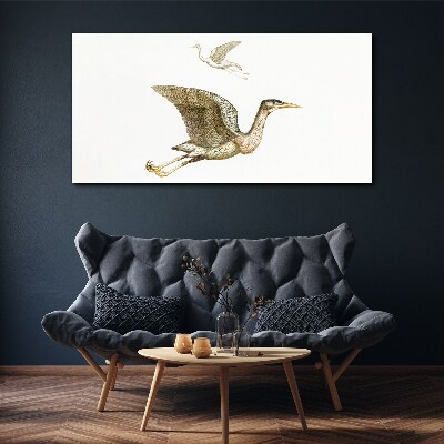 Vászonkép Madár repülése nyugodt víz felett