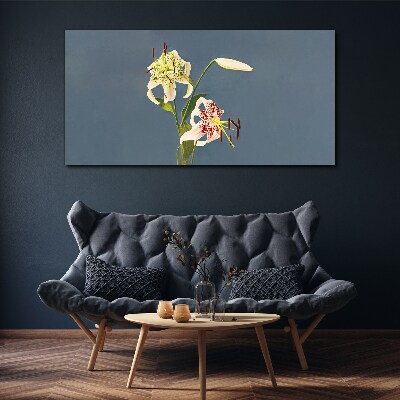 Vászonkép Virágok kék alapon