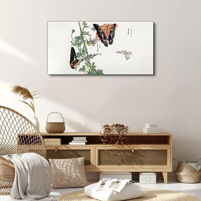 Vászonkép Pillangók a háttérben a virágok