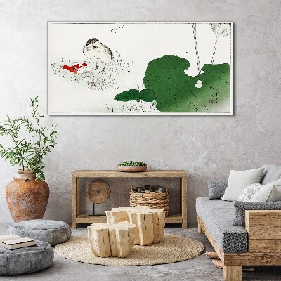 Vászonkép Szárnyas vendég zöld környezetben