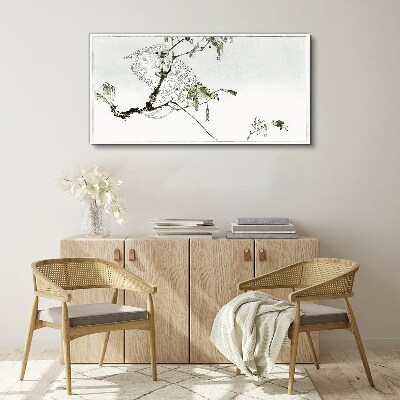 Vászonkép Madár egy ágon