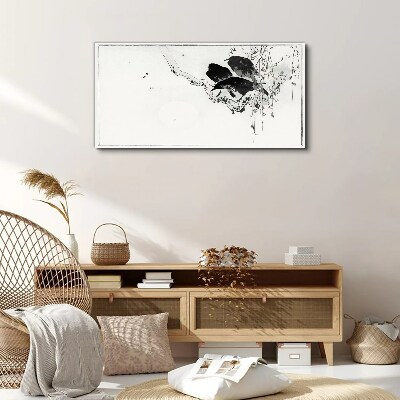 Vászonkép Fekete madarak egy ágon