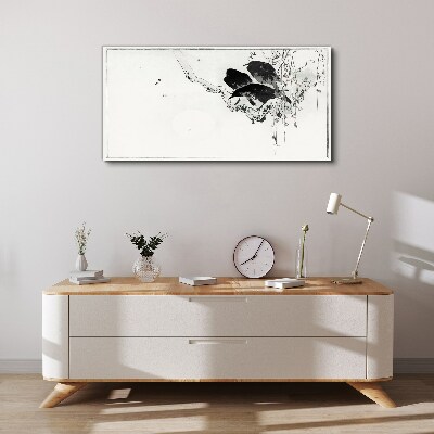 Vászonkép Fekete madarak egy ágon