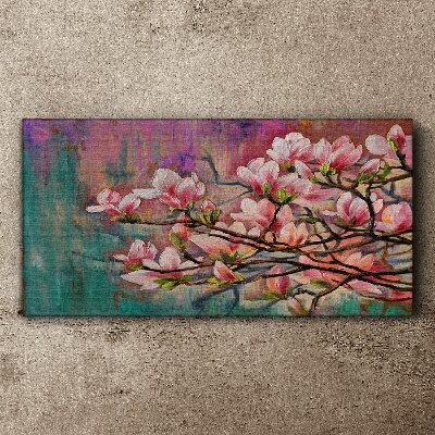 Vászonkép Magnólia virágzik a tavasz hátterében