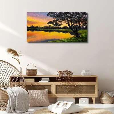 Vászonkép Naplemente a tó felett