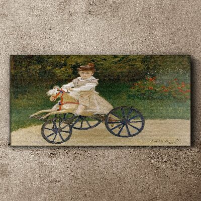 Vászonkép Gyermek egy lovaglón