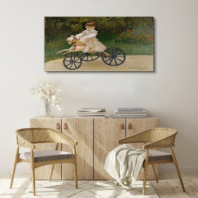 Vászonkép Gyermek egy lovaglón