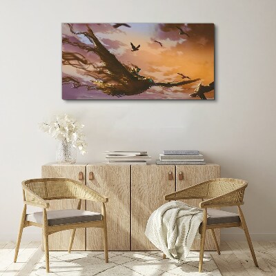 Vászonkép Madarak repülése a lenyugvó napon