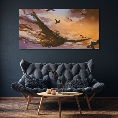 Vászonkép Madarak repülése a lenyugvó napon