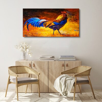 Vászonkép Színes kakas, a háttérben a tűz