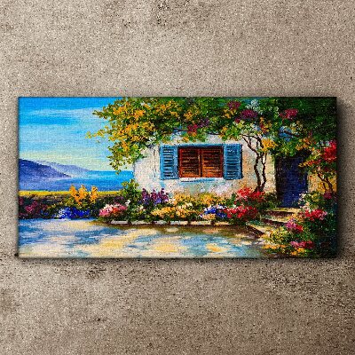 Vászonkép Tengerparti táj virágokkal