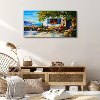 Vászonkép Tengerparti táj virágokkal