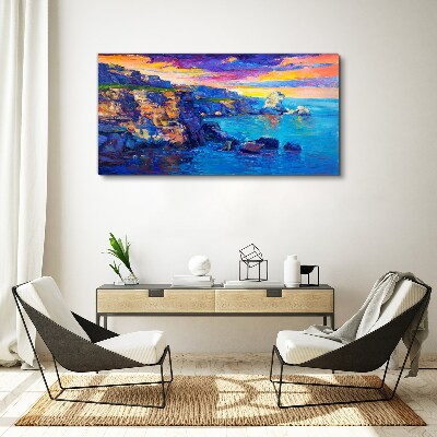 Vászonkép Festői naplemente a part felett