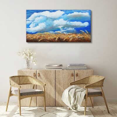 Vászonkép Nyári égbolt egy arany mező felett