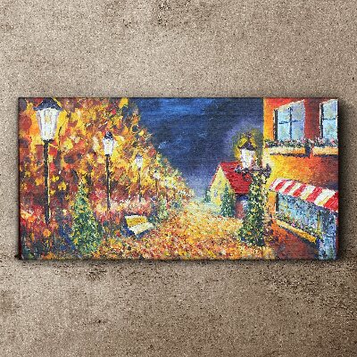 Vászonkép Arany sugárút a lámpások fényében