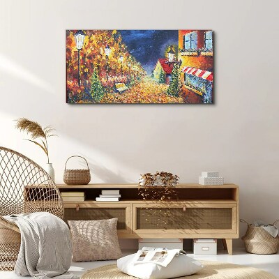 Vászonkép Arany sugárút a lámpások fényében