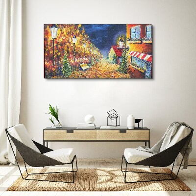 Vászonkép Arany sugárút a lámpások fényében