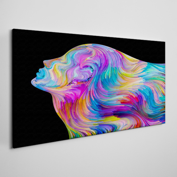 Vászonkép Mozgó nő színes sziluettje