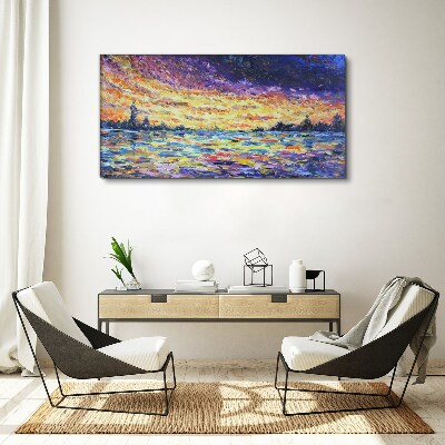 Vászonkép Naplemente a víz felett