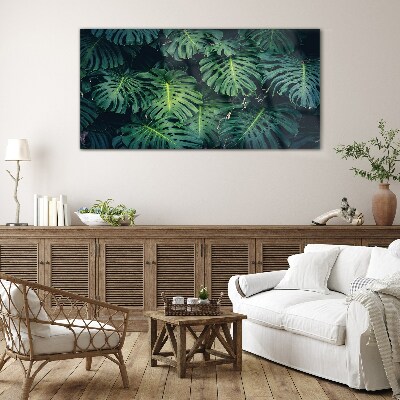Üvegkép Trópusi zöld a Monstera levelekben