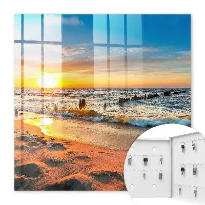 Kulcsdoboz Naplemente a tenger felett egy stranddal