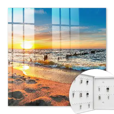 Kulcsdoboz Naplemente a tenger felett egy stranddal