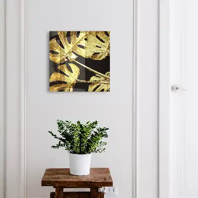 Kulcsdoboz Monstera levelek fekete háttérben
